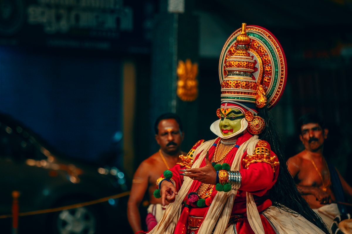 Kathakali performer in traditional costume and makeup