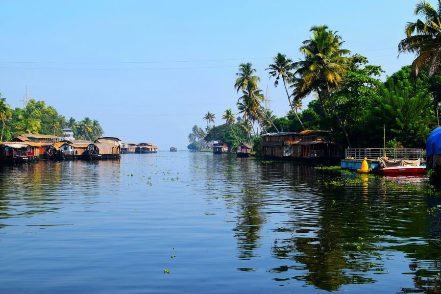Row of houseboats along a Kerala canal